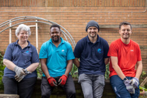 Wales & West Housing staff volunteering at St Mellons Community garden, CardiffWales AirAmbulance